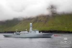 The Danish Navy vessel, HDMS Triton attempts to block the view of the arrest of the Sea Shepherd crew from the Sam Simon.