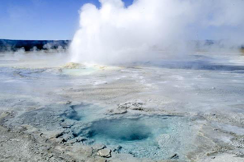 Clepsydra geyser erupting, Fountain Paint Pots, Yellowstone NP, WY. (Photo by George Wuerthner)